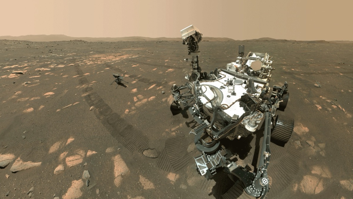 NASA's Perseverance rover with the Ingenuity helicopter on the surface of Mars.