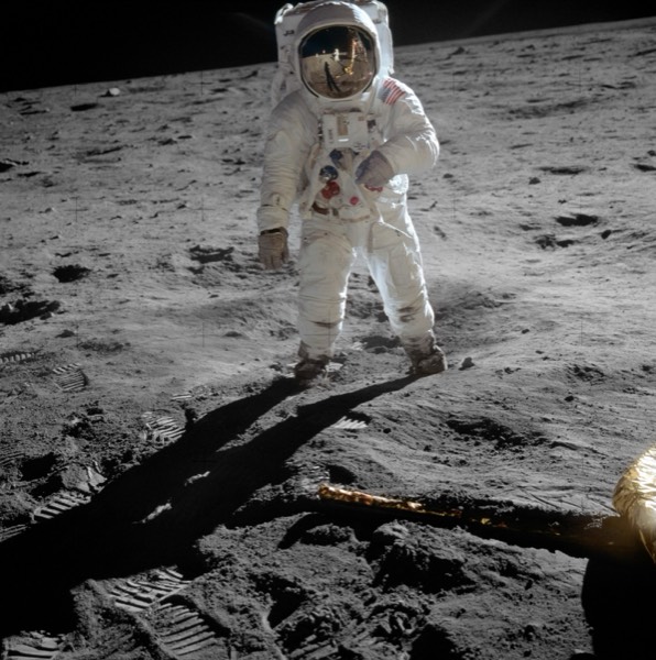 Buzz Aldrin descends the ladder of the Lunar Module Eagle during the Apollo 11 moonwalk.