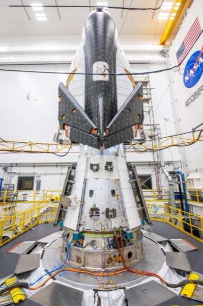 Sierra Space's Dream Chaser Tenacity spacecraft inside a clean room at NASA's Plum Brook station.